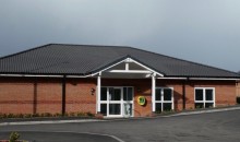 New defibrillator on the front of The Pavilion, next to the Co-op, Hall Bank