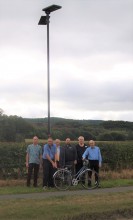Minsterley and Pontesbury Councillors, Clerk and Highline with one of the new solar lights installed on the cycleway linking the two villages